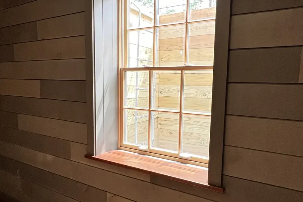 Built-ins and finish carpentry by DeFaria Construction for Gloucester, MA homes, doors and barn doors