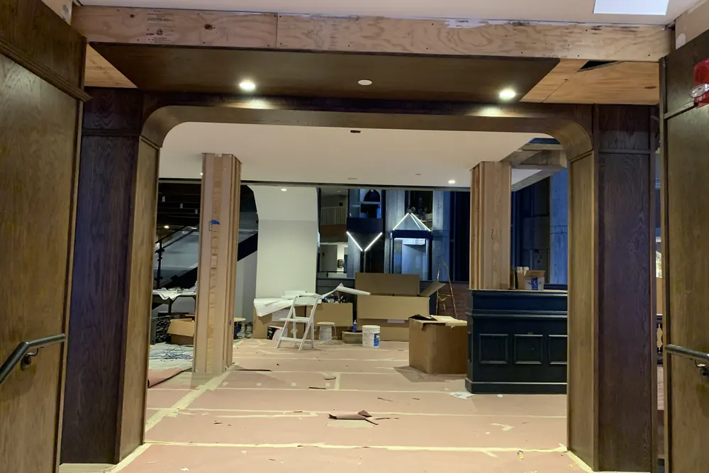 Custom wood archway framing during a restaurant renovation by DeFaria Construction