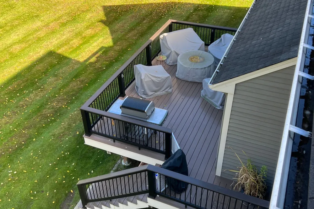 Finished decks and patios in Saugus, MA, finished deck backyard sunset